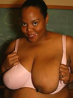 Cassie gets naughty in the classroom with her dildo